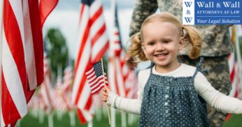 Girl with flags and parent in the military - Child support military