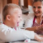 Parent supporting a child with disabilities, symbolizing special needs child support in Utah.