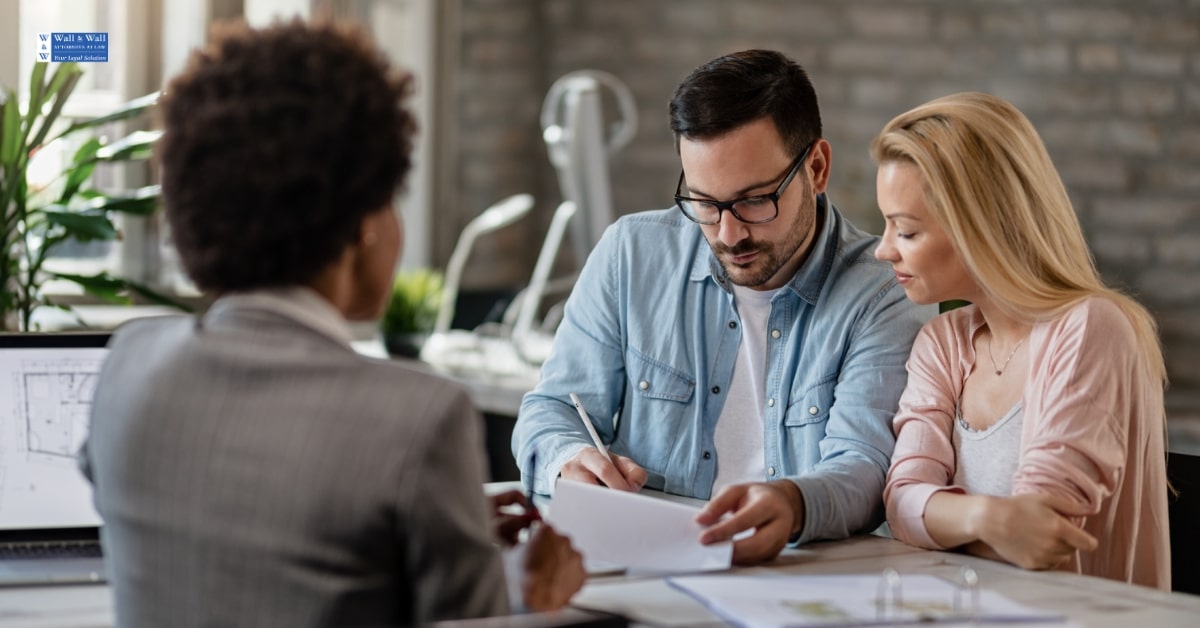 Family lawyer consultation in Utah Couple consulting with a family lawyer in Salt Lake City office